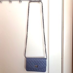 Purple quilted crossbody bag